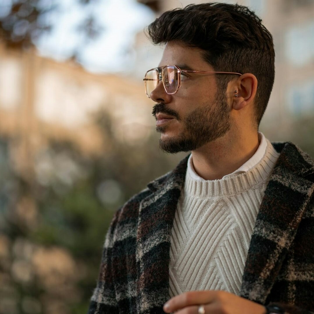 Portrait of a male journalist with glasses